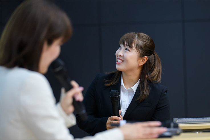 Smiling Mao Saigo at the Report Meeting