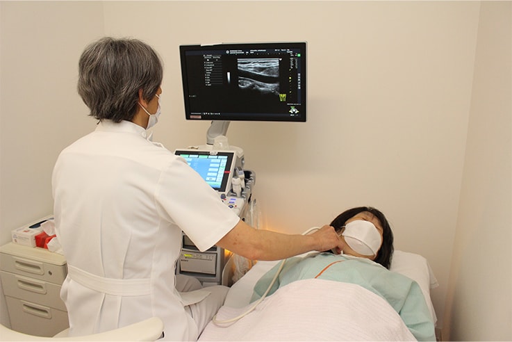Carotid artery ultrasound examinations are conducted at Shimadzu Corporation’s in-house clinic