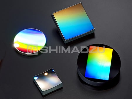 Concave Blazed Holographic Gratings for Polychromators
