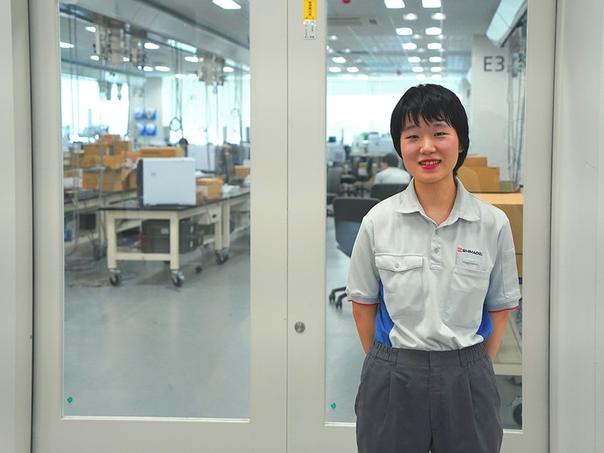 In front of the laboratory at the Healthcare R&D Center where she normally works