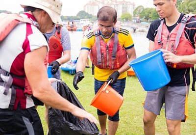 Participants collected plastic waste riding in small boats